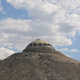 Illustration for article titled A House Shaped Like a Flying Saucer, Perched Atop a Volcano